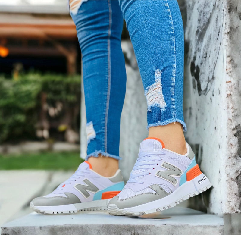 NEW BALANCE GRIS NARANJA