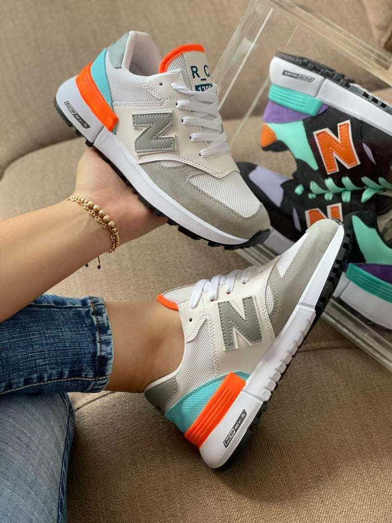 NEW BALANCE GRIS NARANJA