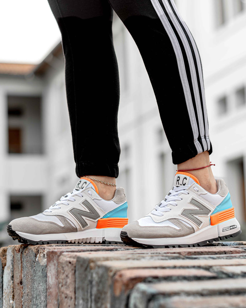 NEW BALANCE GRIS NARANJA